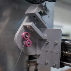 Najbolji materijali za 3D ispis 3 3D-ispisani ružičasto-sivi mehanički dio