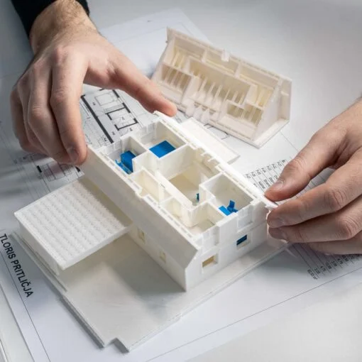 PLA ili PETG: Koje su razlike? 2 Bijeli 3D-ispisani arhitektonski model od PLA