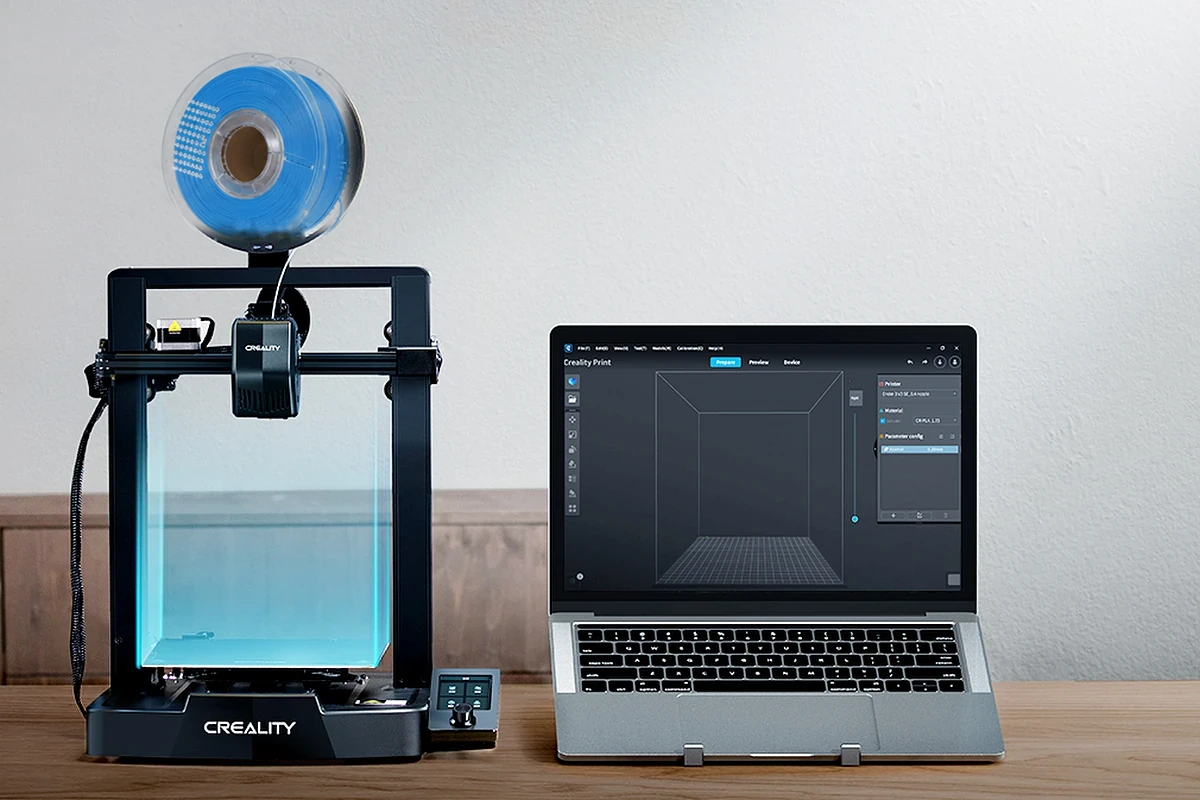Creality Ender 3 V3 SE + PETG 3-pack Basic 2 Creality Ender-3 V3 SE with a laptop on a desk